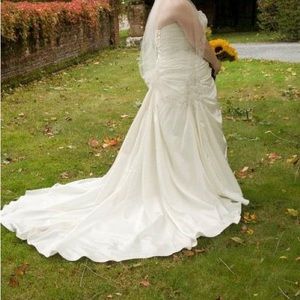 White Satin Wedding gown with lace and bead detail.